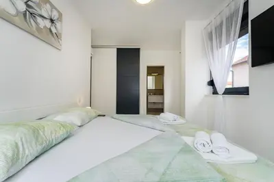 Krevet ili kreveti u jedinici u objektu Villa Essenza Mare in Vodice with private pool & pet friendly - only 650 meters from the beach