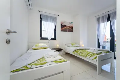 Krevet ili kreveti u jedinici u objektu Villa Essenza Vita in Vodice near Beach with private pool & pet friendly