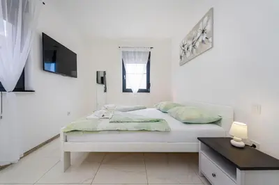 Krevet ili kreveti u jedinici u objektu Villa Essenza Vita in Vodice near Beach with private pool & pet friendly