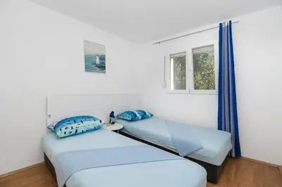 Krevet ili kreveti u jedinici u objektu Apartments Anita Tribunj