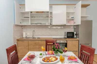 Kuhinja ili čajna kuhinja u objektu Apartments Villa AS Jezera