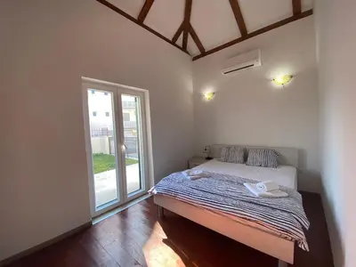 Krevet ili kreveti u jedinici u objektu Lucich Apartments Srima