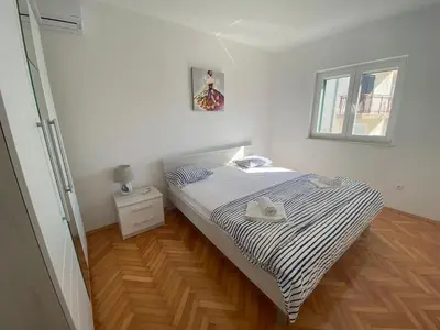 Krevet ili kreveti u jedinici u objektu Lucich Apartments Srima