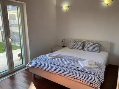 Krevet ili kreveti u jedinici u objektu Lucich Apartments Srima