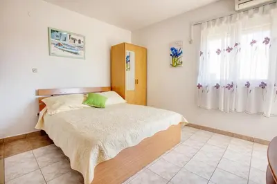 Krevet ili kreveti u jedinici u objektu Apartments by the sea Rogoznica - 19367