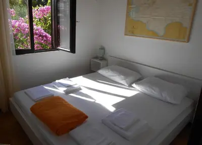 Krevet ili kreveti u jedinici u objektu Holiday House Mia