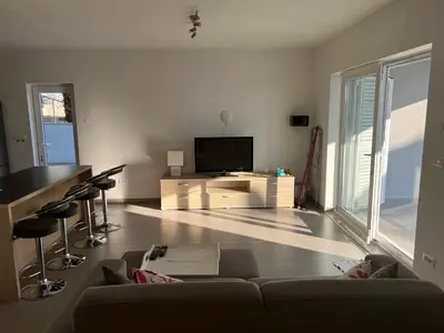 TV i/ili zabavni centar u objektu Villa Pina Tisno Apartment Luca 4-6 Pers
