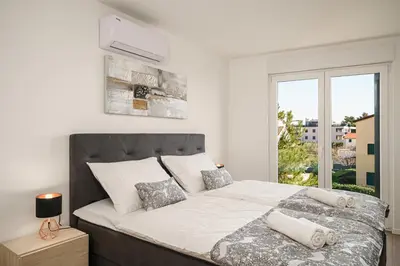 Krevet ili kreveti u jedinici u objektu Apartment SABBIA