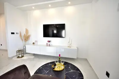 TV i/ili zabavni centar u objektu Apartman Villa Marina