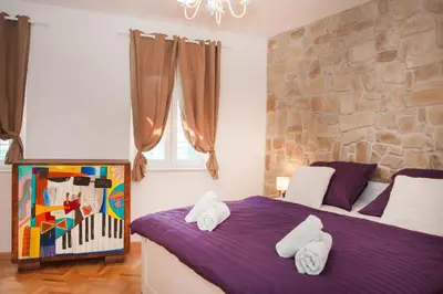Krevet ili kreveti u jedinici u objektu Apartments Laurus