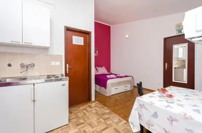 Kuhinja ili čajna kuhinja u objektu Apartments and Room Take it easy