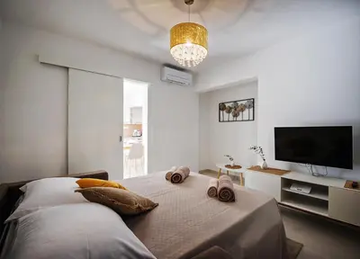 Krevet ili kreveti u jedinici u objektu Sea Front Apartments Ivana