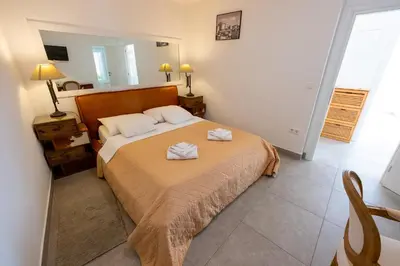 Krevet ili kreveti u jedinici u objektu Downtown Luxury Apartments with Hot Tub