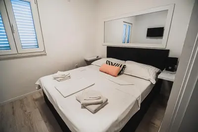 Krevet ili kreveti u jedinici u objektu Downtown Park Apartments with Balcony