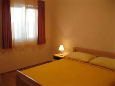 Krevet ili kreveti u jedinici u objektu Apartments Dijana