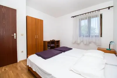 Krevet ili kreveti u jedinici u objektu Apartments Goran near the beach