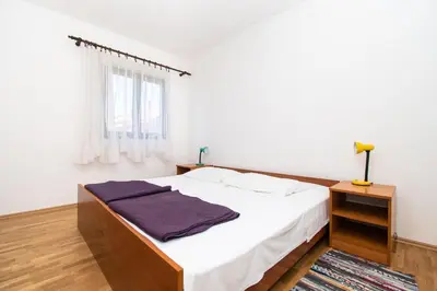Krevet ili kreveti u jedinici u objektu Apartments Goran near the beach