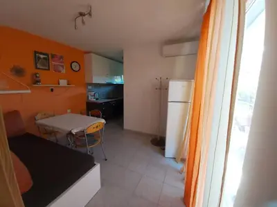 Kuhinja ili čajna kuhinja u objektu Kia Ora Apartment