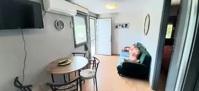 TV i/ili zabavni centar u objektu Apartman Olive grove