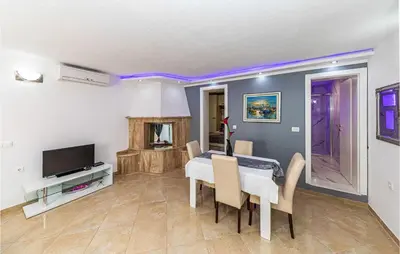 TV i/ili zabavni centar u objektu Lovely Home In Zecevo Rogoznicko