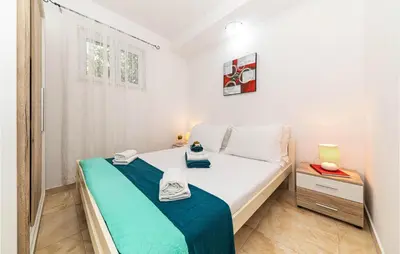Krevet ili kreveti u jedinici u objektu Lovely Home In Zecevo Rogoznicko