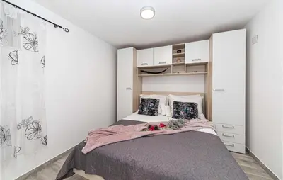 Krevet ili kreveti u jedinici u objektu Lovely Home In Zecevo Rogoznicko