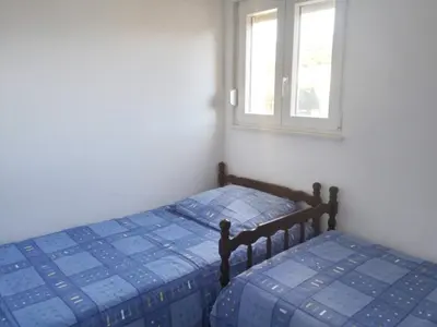 Krevet ili kreveti u jedinici u objektu Apartments and Room Lotus