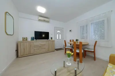 TV i/ili zabavni centar u objektu Apartment Zamalin SeaView