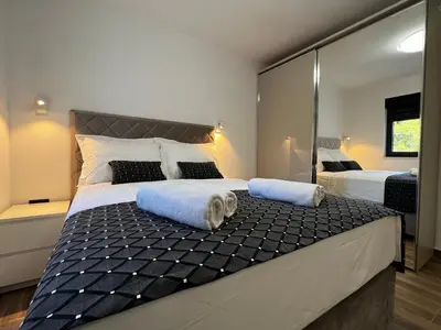 Krevet ili kreveti u jedinici u objektu White Pearl Apartments - NEW