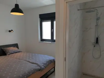 Krevet ili kreveti u jedinici u objektu Apartman Retro with heated pool and gym for 8