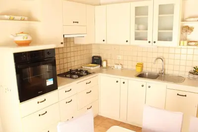 Kuhinja ili čajna kuhinja u objektu Garden house Apartments