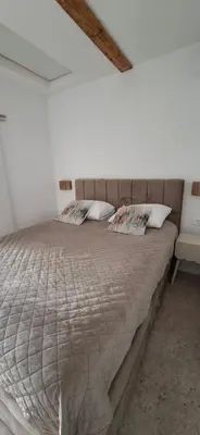 Krevet ili kreveti u jedinici u objektu Mellon Apartments