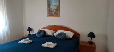 Krevet ili kreveti u jedinici u objektu Mellon Apartments