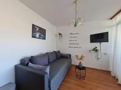 TV i/ili zabavni centar u objektu Mellon Apartments