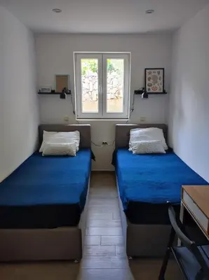 Krevet ili kreveti u jedinici u objektu Apartmani Rak