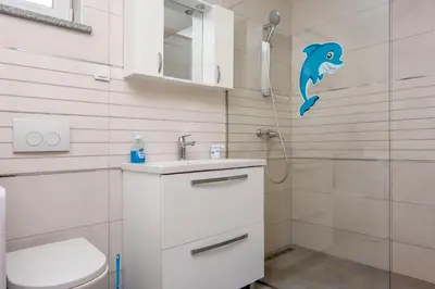 Kupaonica u objektu Apartments Mario