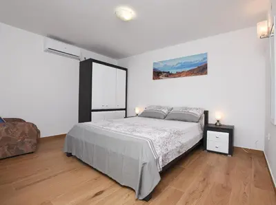 Krevet ili kreveti u jedinici u objektu Apartments Mario