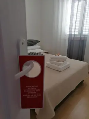 Krevet ili kreveti u jedinici u objektu Apartman Grlić family suite Vodice Croatia