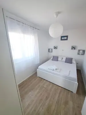 Krevet ili kreveti u jedinici u objektu Apartments Janja