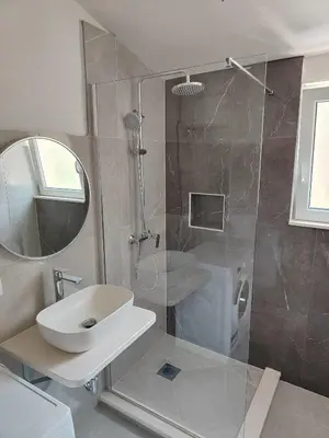 Kupaonica u objektu Apartments Radić