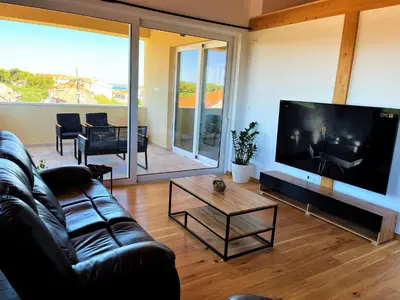 TV i/ili zabavni centar u objektu Pekasovi Seaview Apartament on a beautiful island Krapanj