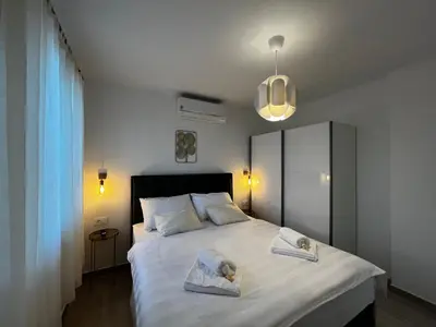 Krevet ili kreveti u jedinici u objektu Pekasovi Seaview Apartament on a beautiful island Krapanj