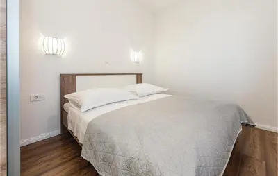 Krevet ili kreveti u jedinici u objektu Lovely Apartment In Sibenik With Sauna