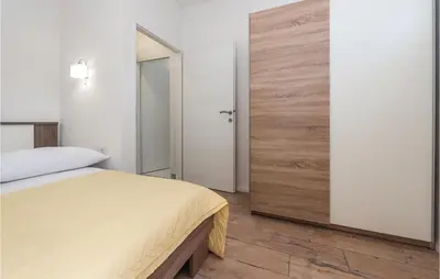 Krevet ili kreveti u jedinici u objektu Lovely Apartment In Sibenik With Sauna