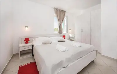 Krevet ili kreveti u jedinici u objektu 1 Bedroom Cozy Apartment In Grebastica