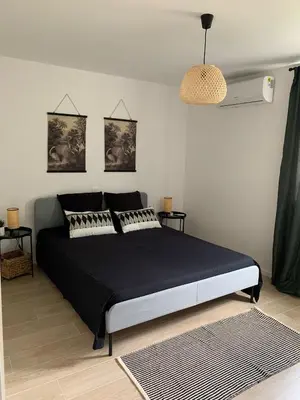 Krevet ili kreveti u jedinici u objektu A cosy renovated one bedroom appartement with parking space and near the sea and the historical city center