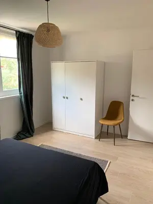 Krevet ili kreveti u jedinici u objektu A cosy renovated one bedroom appartement with parking space and near the sea and the historical city center
