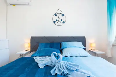 Krevet ili kreveti u jedinici u objektu Blue Swan Residence - Central Pirovac - Beach - Netflix