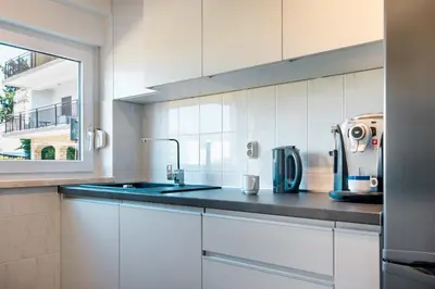 Kuhinja ili čajna kuhinja u objektu Blue Swan Residence - Central Pirovac - Beach - Netflix