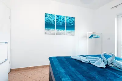 Krevet ili kreveti u jedinici u objektu Blue Swan Residence - Central Pirovac - Beach - Netflix